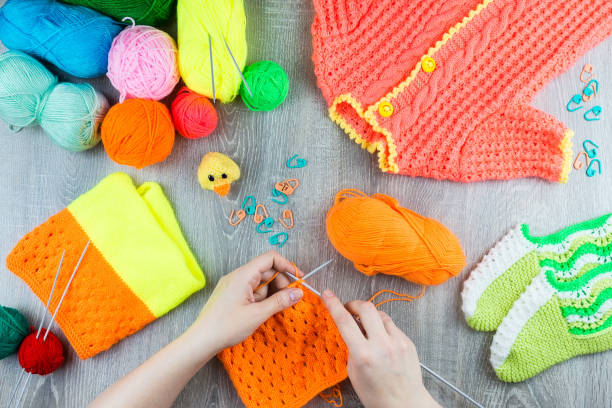 istock girl knits sock knitting needles 946648026