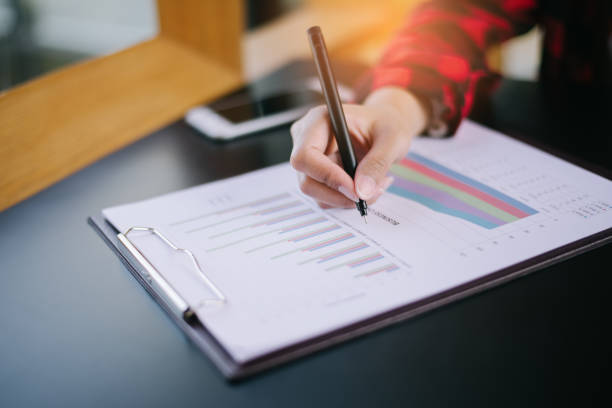 istock Business woman working in office with documents 946651144