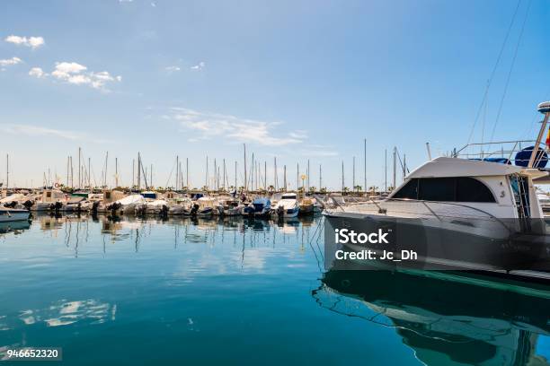 Recreational Boat Moored In Marina Stock Photo - Download Image Now - Blue, Harbor, Horizontal