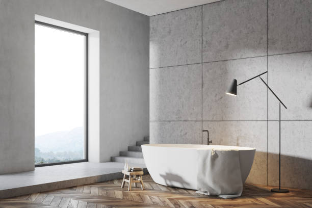 istock Gray bathroom interior, white tub side 946657688