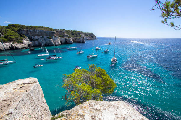 istock Boats and yachts on Macarella beach, Menorca, Spain 946657898
