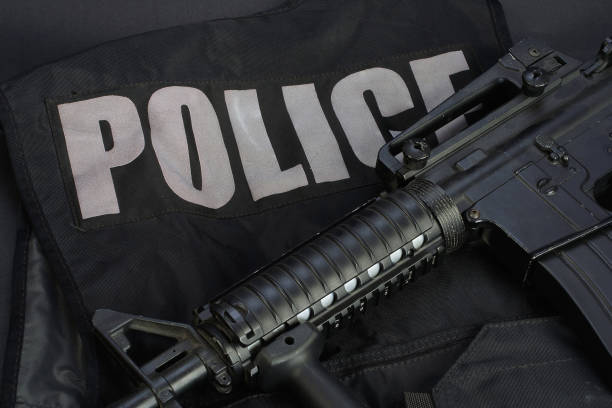 istock Special weapons and tactics team equipment on black background 946661808