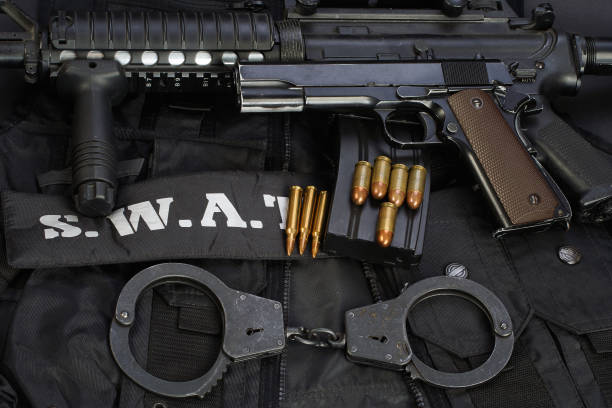 istock Special weapons and tactics team equipment on black background 946661830