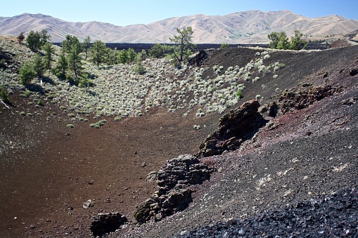 lava fields and mountains with little tree cover