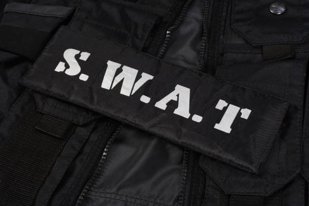 istock Special weapons and tactics team equipment on black background 946662012