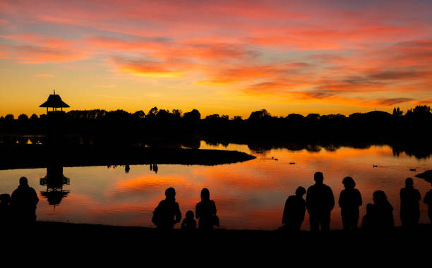 Still waters at Henley Lake Park, Masterton, New Zealand at dawn.