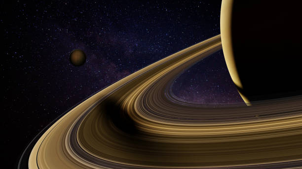 istock Saturn's moon Enceladus casts shadow on the rings 946672568