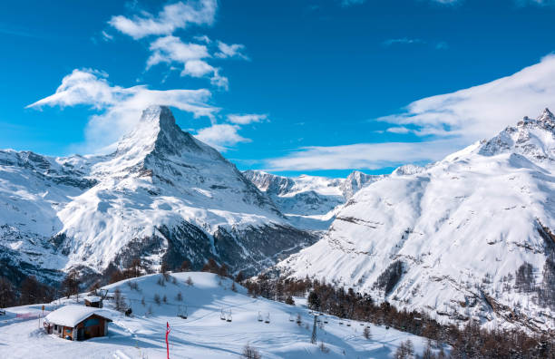 istock Mountain tops. Alpine mountains. Ski resort view 946672748