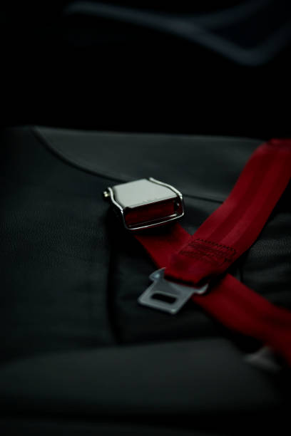 istock Red airplane safety belt 946675432