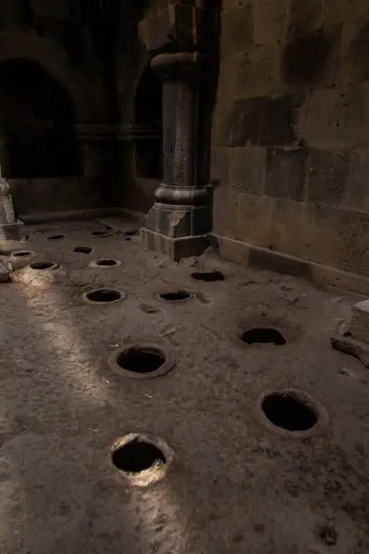 Photo of The Haghpat monastery in Armenia. Openings in the floor in places where old letters were hidden