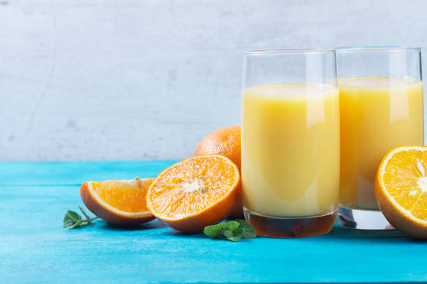istock Orange juice in glass 946676288