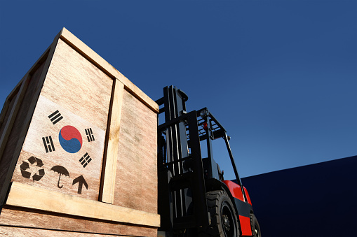 Forklift truck with boxes on pallet. Import export cargo concept.