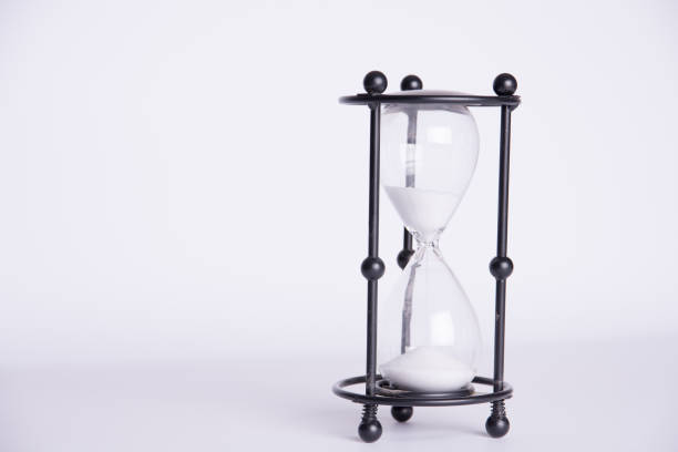 istock an image of hourglass on a white background 946689822