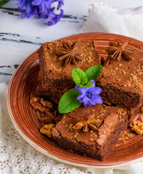 istock chocolate brownie pieces lie on a round plate 946693450