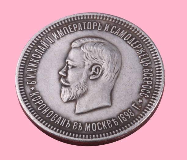 istock ruble coin isolated on pink background 946695722