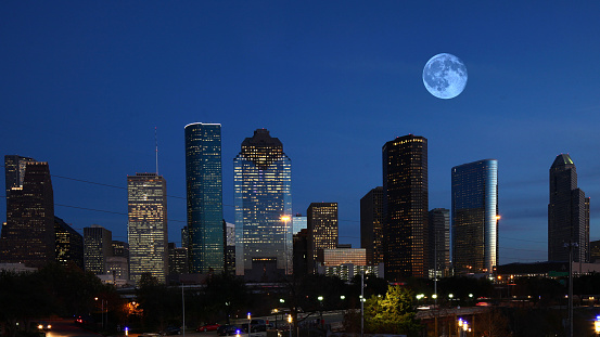 The Houston, Texas skyline with moon