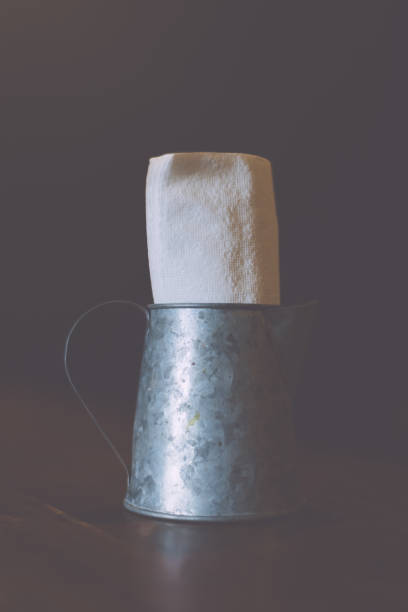 istock Cans, paper tissues on the table,Vintage Tone. 946702790