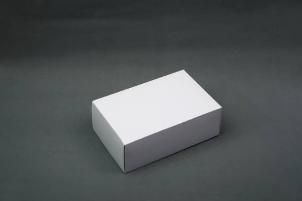 istock Empty Package white cardboard box or tray  for product on grey background. 946705982