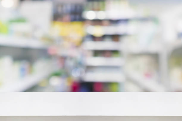 istock pharmacy drugstore shop interior blur background 946707496