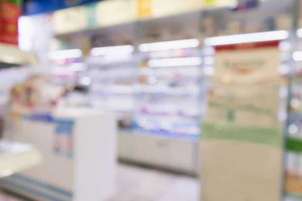 istock pharmacy drugstore shop interior blur background 946707500