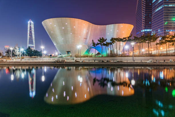 Tri-bowl building at night This is a night view of the famous Tri-Bowl building in Songdo financial district's Central park on Feburary 10, 2016 in Incheon songdo ibd stock pictures, royalty-free photos & images