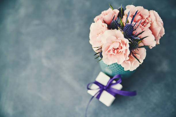 istock Handmade rose bouquet with gift for Mother's Day 946719646
