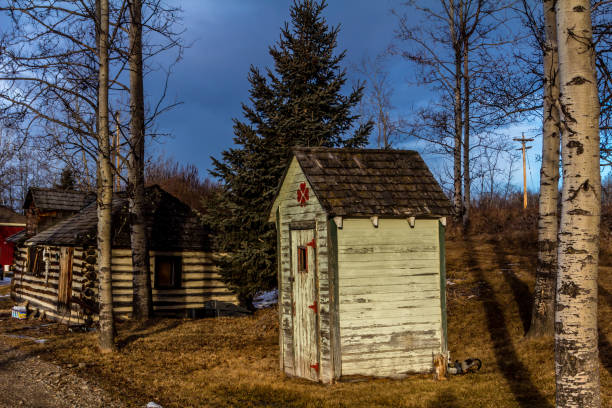 Colourful rustic out house, Millarville, Alberta, Canada