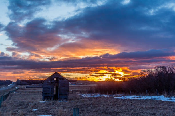 istock Stunning sunrise over rustic out building, Springbank, Alberta, Canada 946725302