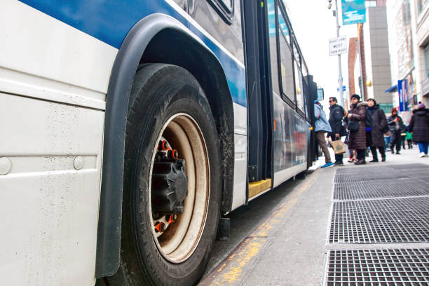 New York, March 11, 2017: People are boarding an MTA city bus in Manhattan.