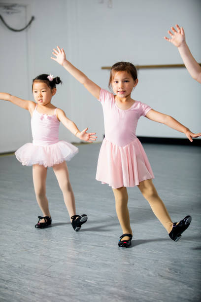 little girls dancing in studio - jazz ballet imagens e fotografias de stock