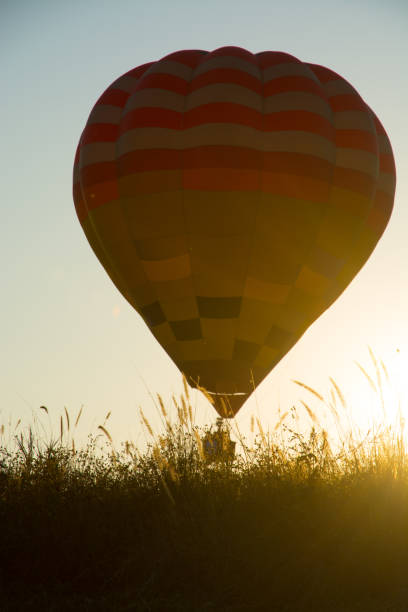 istock Hot Air Balloons Beautiful Silhouette in the sunset 946748206