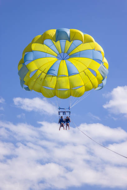 istock Two girls on the parasailing 946751952