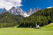 San Giovanni Church in front of Odle Group mountain peaks