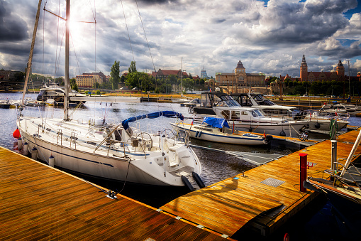 Home city marina with sea yachts and view of the Szczecin old town, Poland