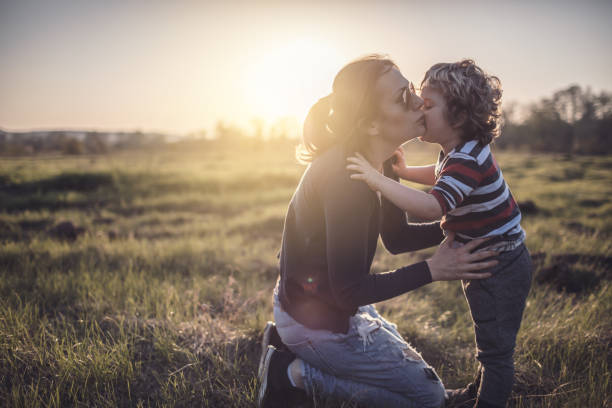 istock Mother and son in nature 946769938
