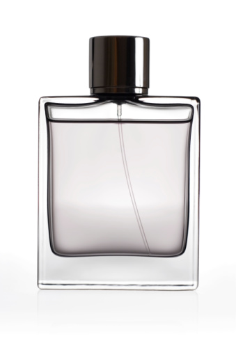 Bottle of perfume isolated over a white background. 