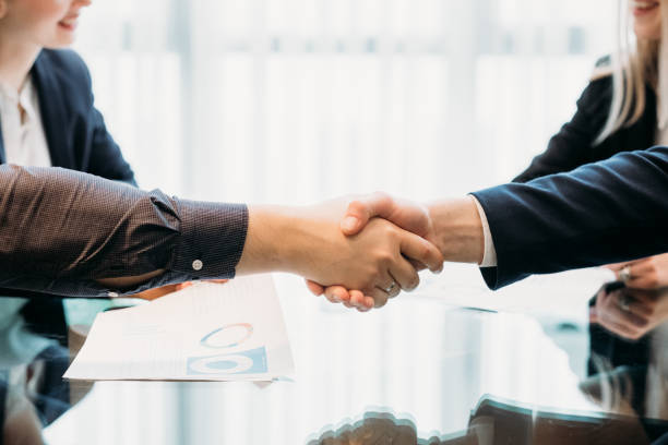 istock close seal deal business partner shaking hands 946780814