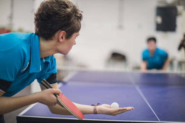 istock Girl playing ping-pong 946783688