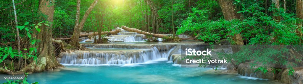 Panoramic beautiful deep forest waterfall in Thailand Waterfall Stock Photo