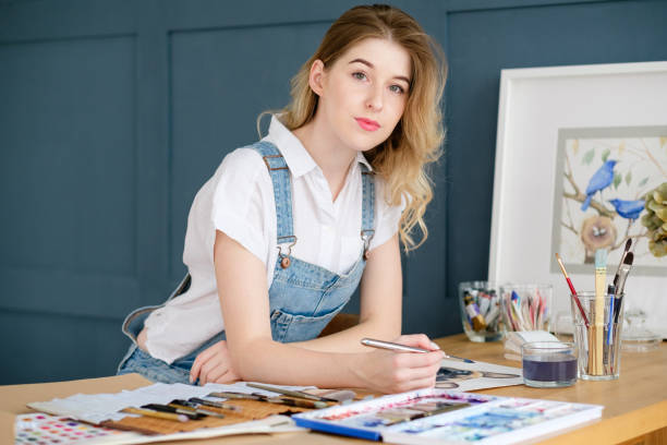 istock leisure art talent expression girl drawing picture 946787232