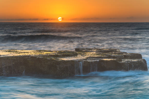 istock Sunrise Seascape from Rock Platform 946787524