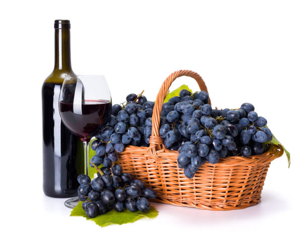 istock Red wine and ripe blue grape in basket 946788490