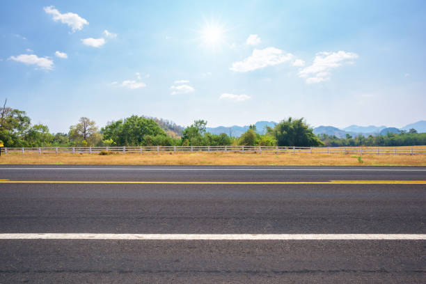 istock Asphalt road and countryside views 946788506