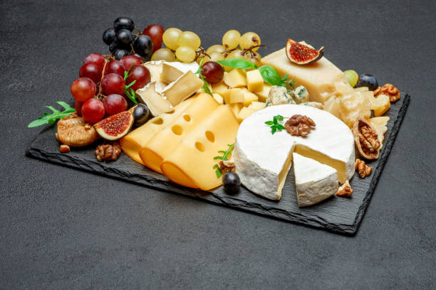 istock various types of cheese on stone serving board 946788508