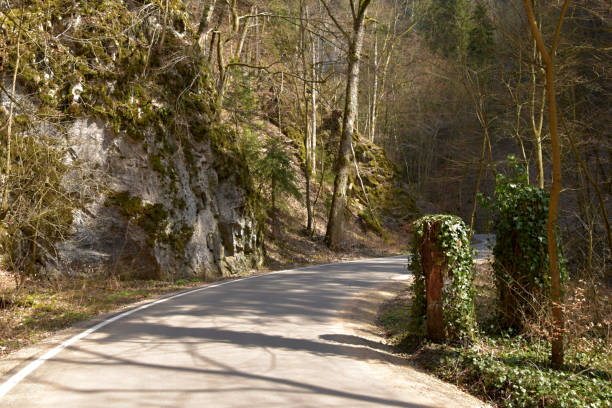 istock A winding road leading rocky valley. 946790852