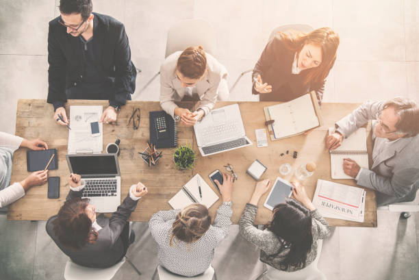 istock Group of business people working in office 946795694