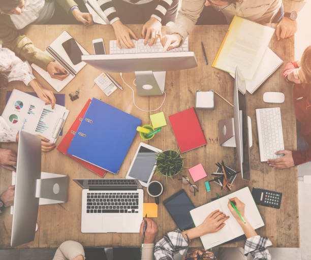 istock Group of business people working in office 946798376