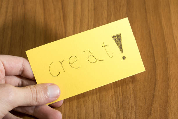 istock Great handwrite on a yellow paper with a pen on a table composition 946802664