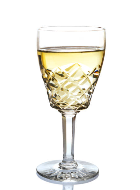 istock Wine glass, crystal, white wine, white background 946803384