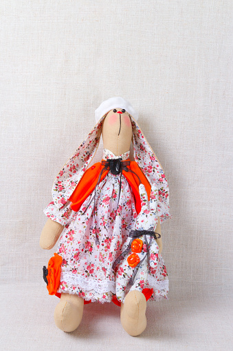toys, bunnies, rabbits, handmade in a French white dress with flowers and a beret on her head